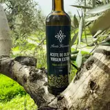 Botella de Aceite Herencia en el olivar